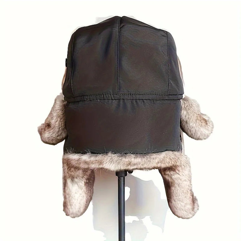 Trapper pipo tekoturkis korvaläpillä ja säädettävällä soljella