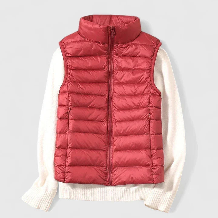 Naisten untuvaliivi sateelta suojattu
