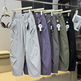 Miesten kulahdus- ja naiset kevyt vedenpitävä nopea kuiva ulkoilu kävely löysä rento techwear raidallinen rahkeet