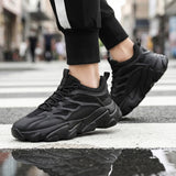 Unisex casual sneakers kevyet ja hengittävät mustat tennarit arkikäyttöön