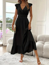 Maxi-ilta-asu – frillihihat, V-pääntie, rypytetty vyötärö