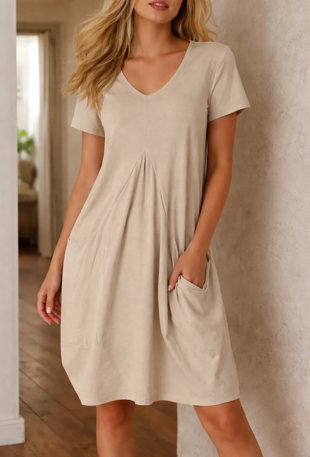 A-lijn jurk taskuineen | Kotiintuodut V-kaula | Polvienpituus