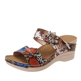 Zia | Leopardikuvioiset nahkaiset kiilapohjalliset sandaalit-Shoes-EmiyoSuomi